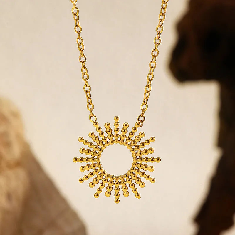 SUNFLOWER Series 14K gold necklace and bracelet set with geometric chain design on white background