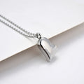 Silver curved peach heart stainless steel pendant necklace on a chain