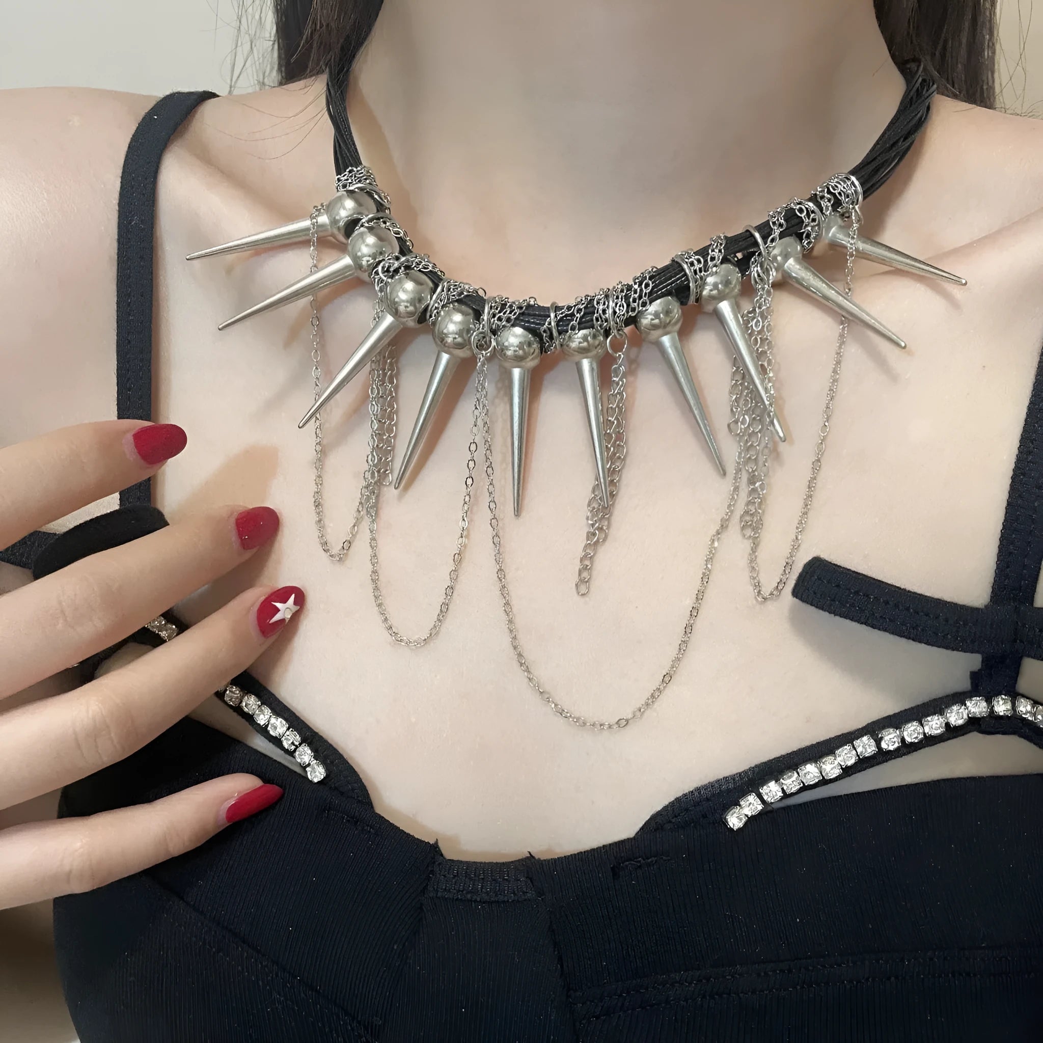 Women's rivet round beads winding tassel necklace with leather cord and electroplated brass accents.