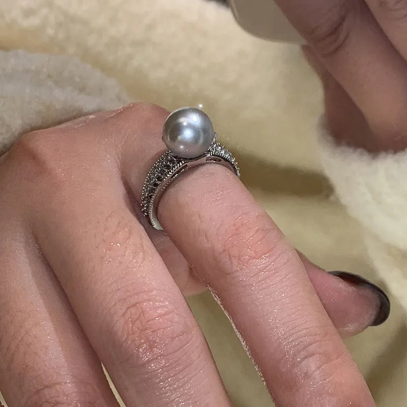 Geometric open ring with black pearl on adjustable copper band for women
