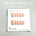Set of Frosted Velvet and Cat's Eye effect false nails in short ladder sizes on a clear background.
