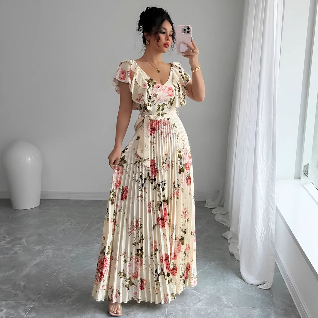Apricot floral print dress with V-neck, ruffled sleeves, and a swing skirt.