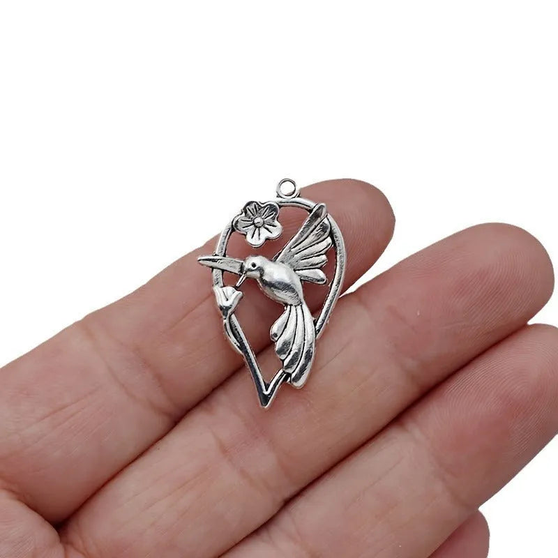 Alloy flying cuckoo bird pendant charm with electroplated finish for DIY jewellery making