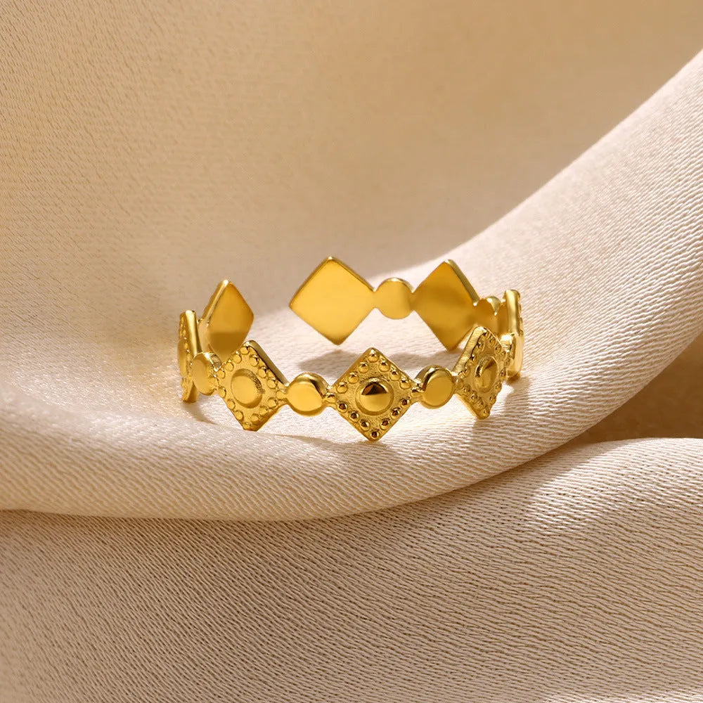 Geometric titanium steel women's ring with gold diamond finish
