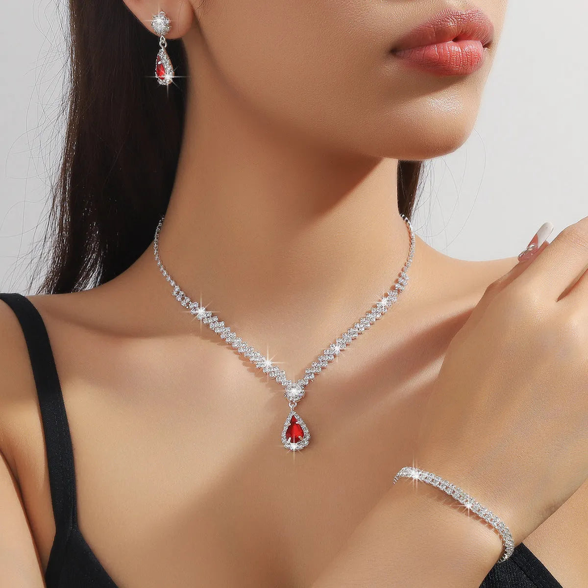 Rhinestone claw chain necklace and matching water drop earrings set in selected colour