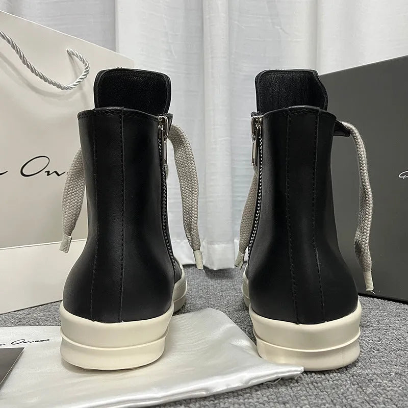 Black genuine leather high-top sneakers with a side zipper on a mid-heel platform sole.