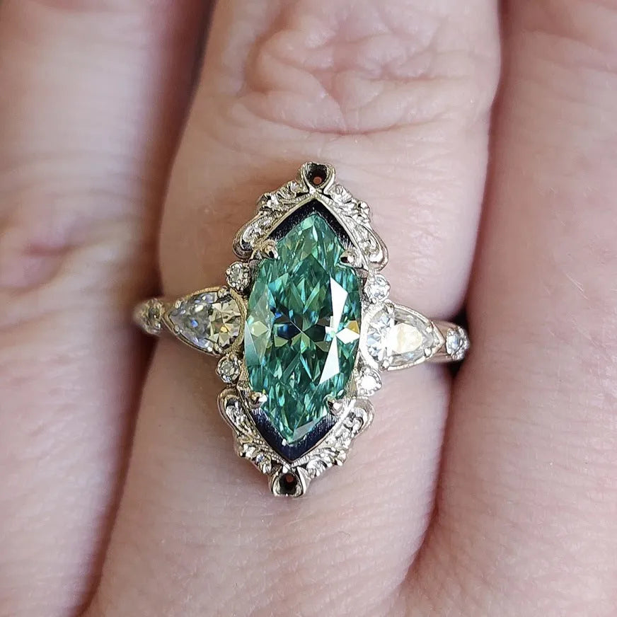 Alloy flower ring with green horse eye zircon centre electroplated silver finish available sizes No 6 to No 10