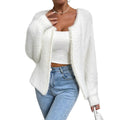 Women's solid white V-neck cardigan with beaded knit detail, shown on a hanger.
