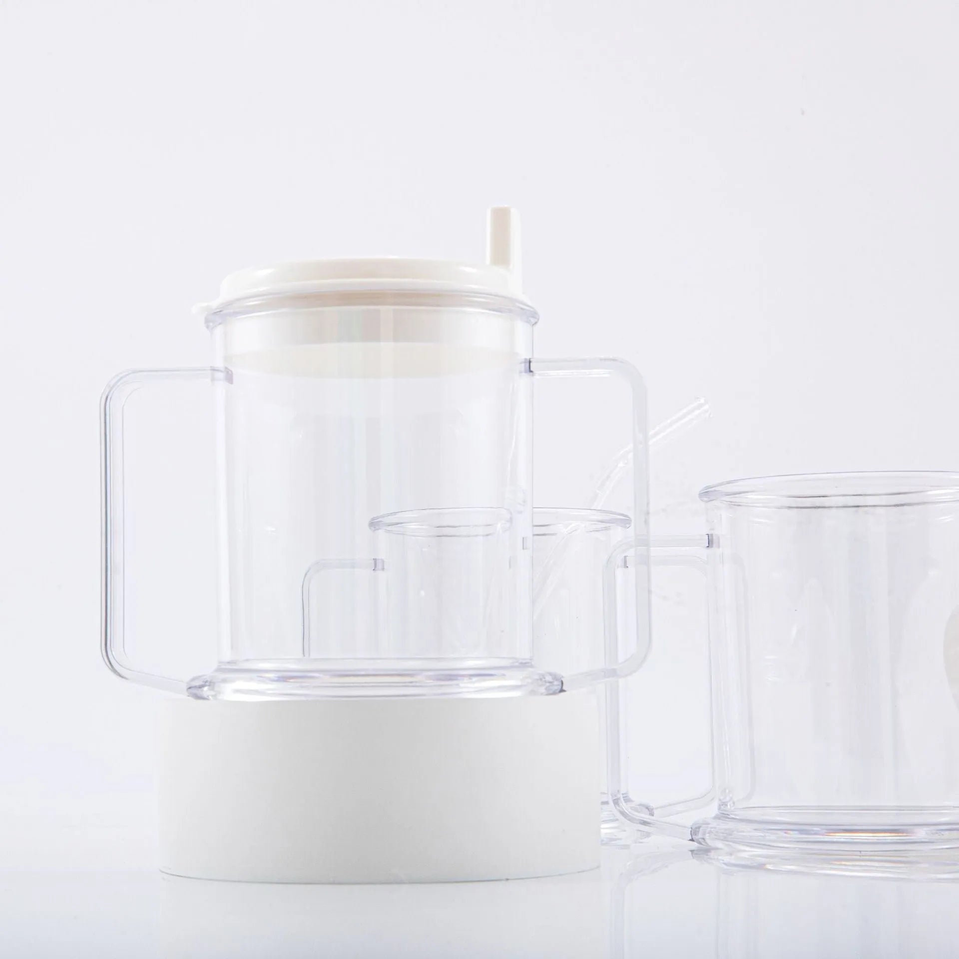 Transparent PP plastic drinking cup with spill-proof lid showing 14cm height