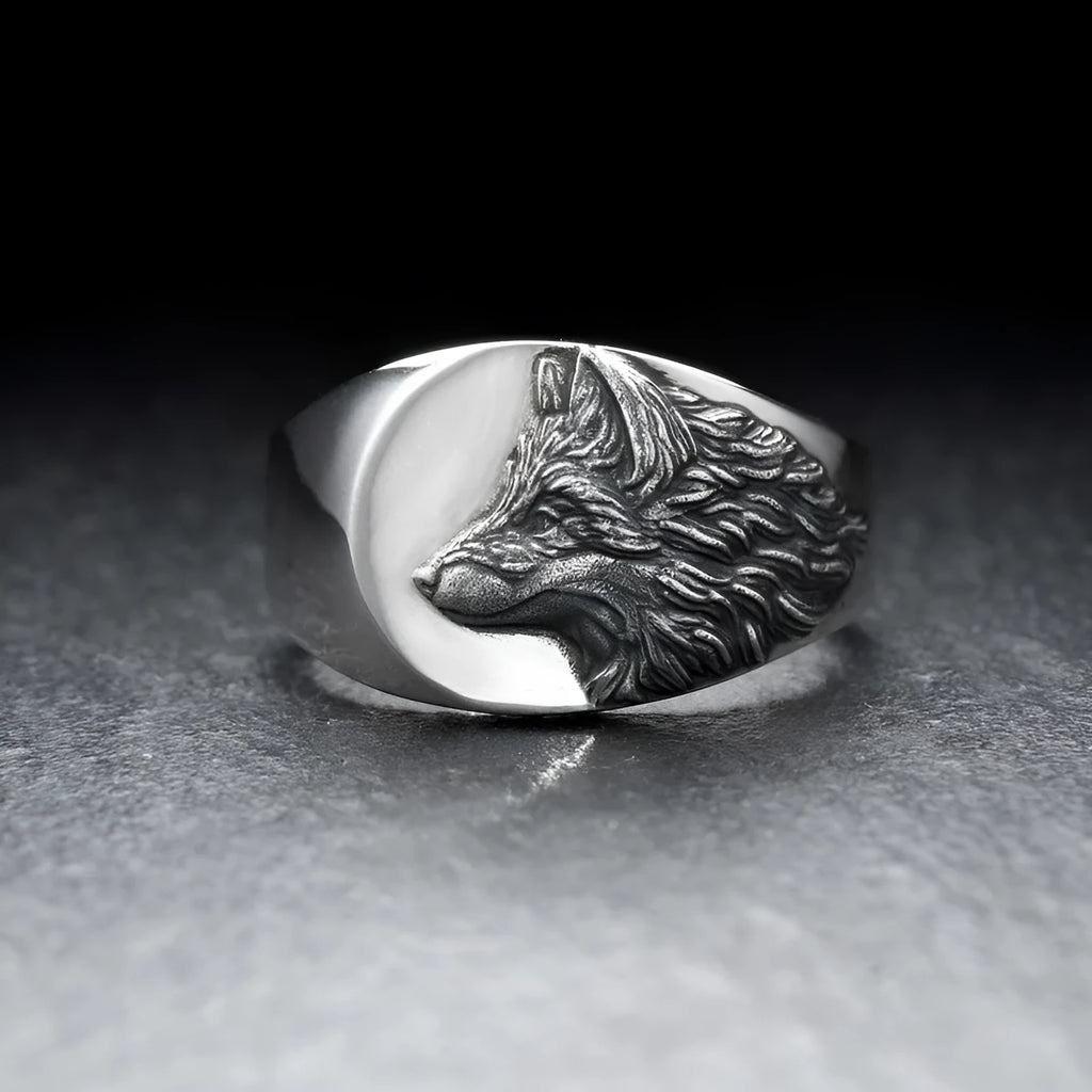 Close up of men's silver alloy ring featuring a geometric wolf head design in retro style