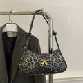 Women's casual large capacity PU shoulder handbag in black with sandwich pocket