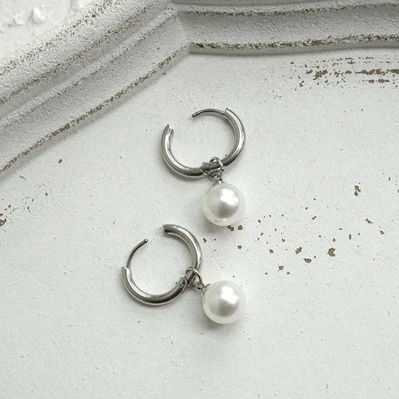 Alloy geometric pearl drop earrings with titanium steel posts, approximately 20-24mm length