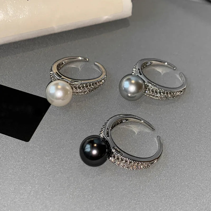 Geometric open ring with black pearl on adjustable copper band for women
