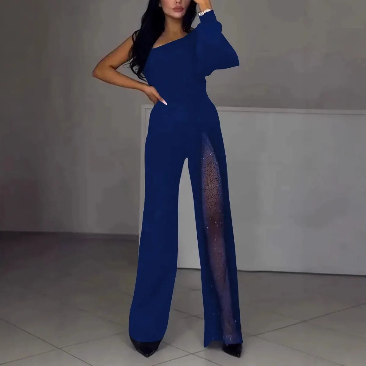 Women's black polyester jumpsuit with oblique shoulder design and high slit leg opening