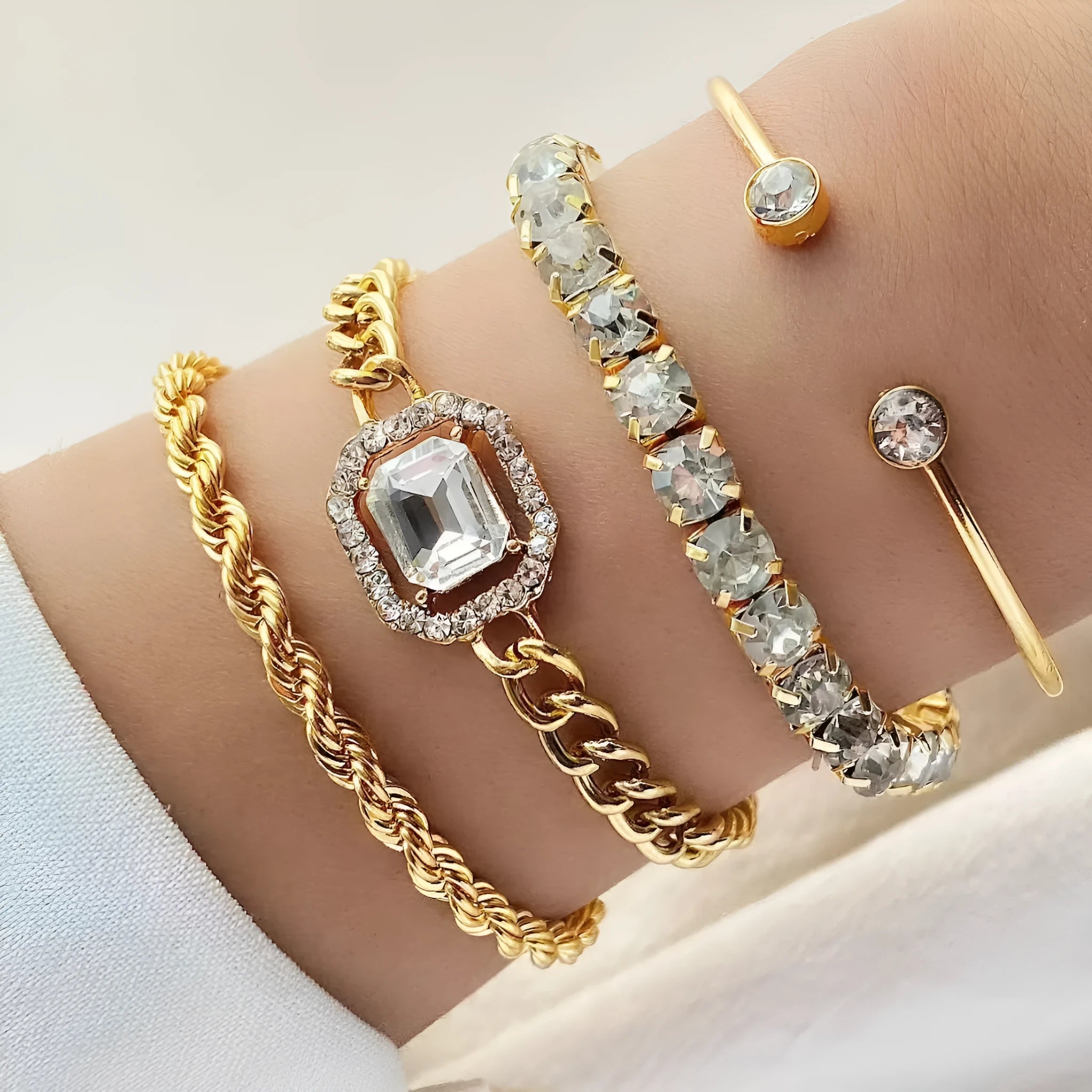 Women's four-piece retro geometric bracelet set in gold or silver alloy with square diamond design