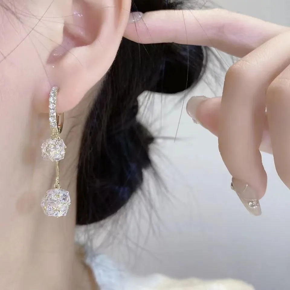 Silver balloon confession tassel earrings with rhinestone ball and drop shape design