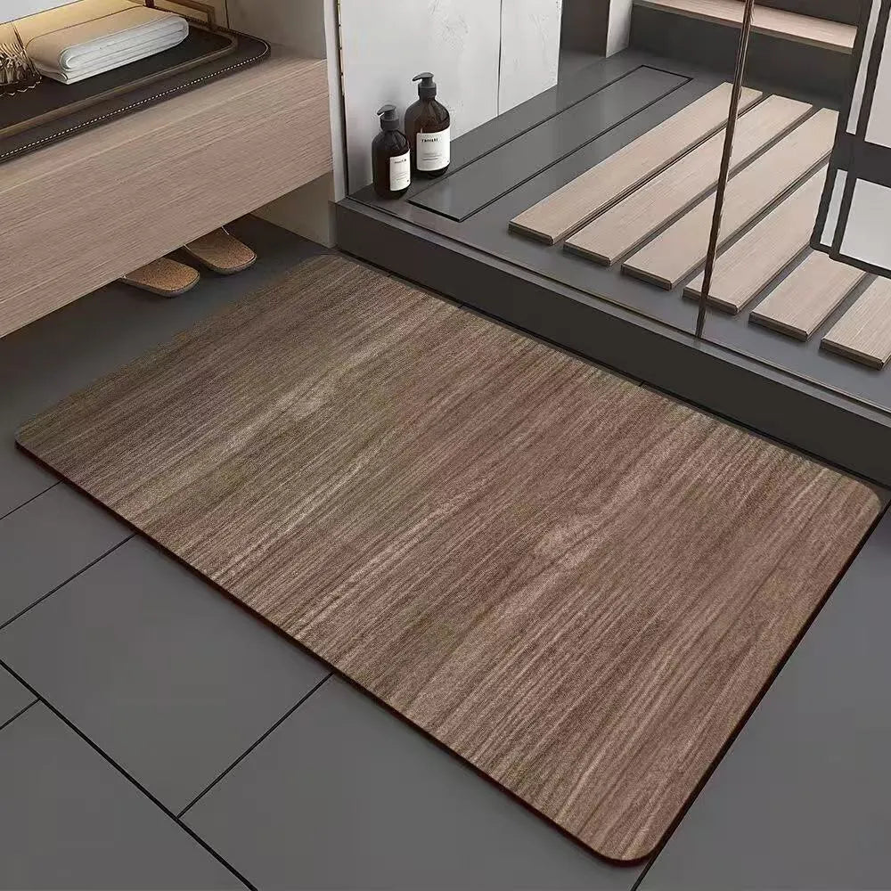 Square diatomite bath mat with a geometric wood grain pattern in a bathroom setting.