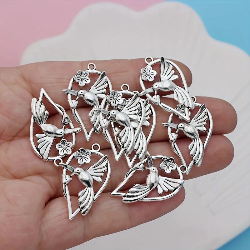Alloy flying cuckoo bird pendant charm with electroplated finish for DIY jewellery making