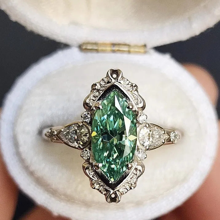 Alloy flower ring with green horse eye zircon centre electroplated silver finish available sizes No 6 to No 10