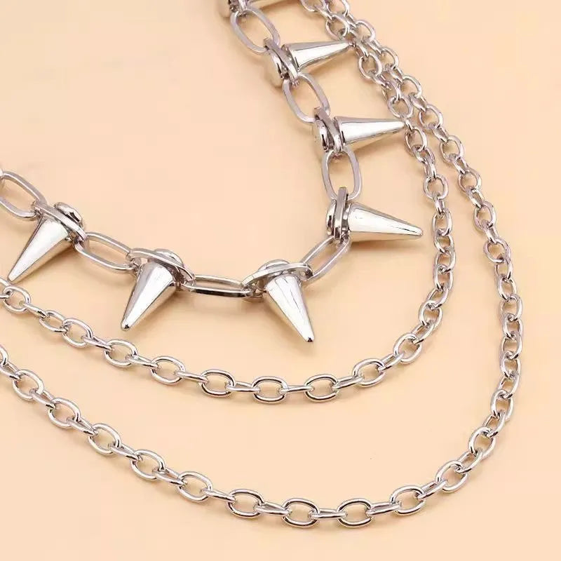 Silver metal pants chain with dark punk rivets measuring 115cm length