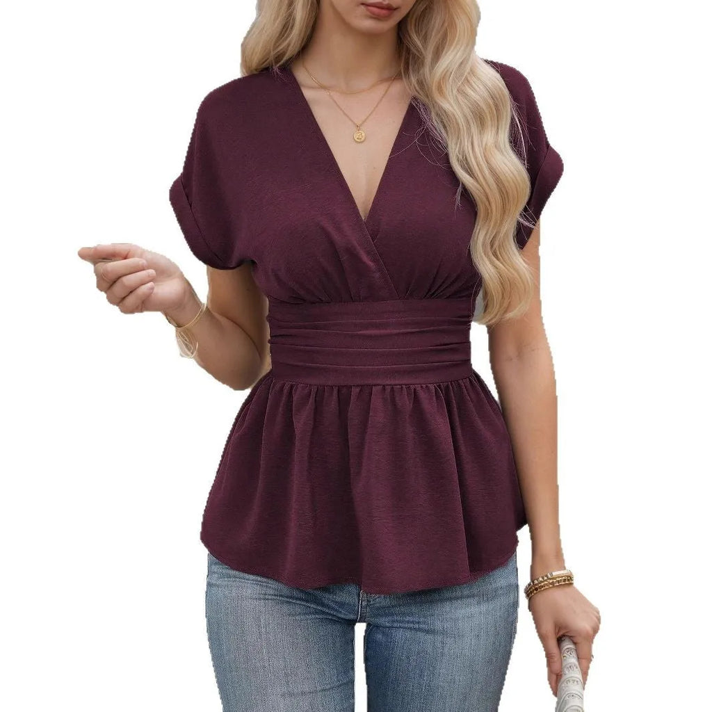 Women's slim fit V-neck top with pleated waist detail in solid colour polyester.
