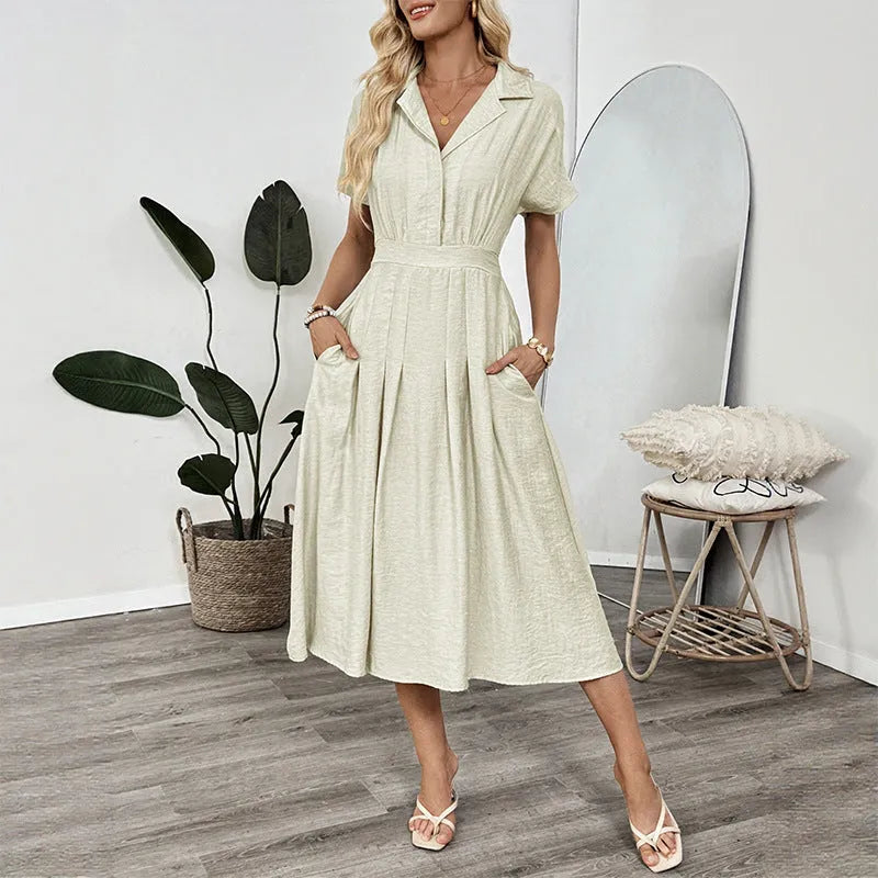 Light green women's shirt dress with lapel collar, waist tie belt, and side seam pockets.