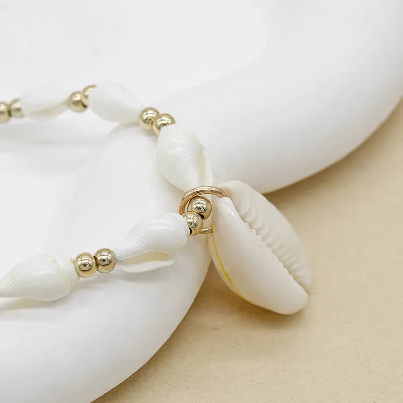 White conch shell necklace with mother of pearl pendant on silver electroplated chain