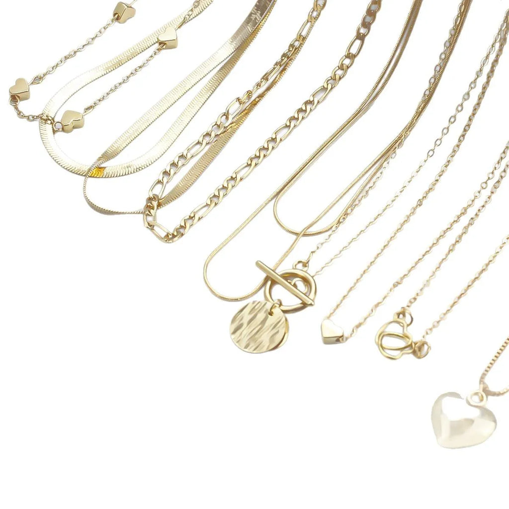 Ten-piece gold women's necklace set with adjustable snake bone chains and alloy pendants