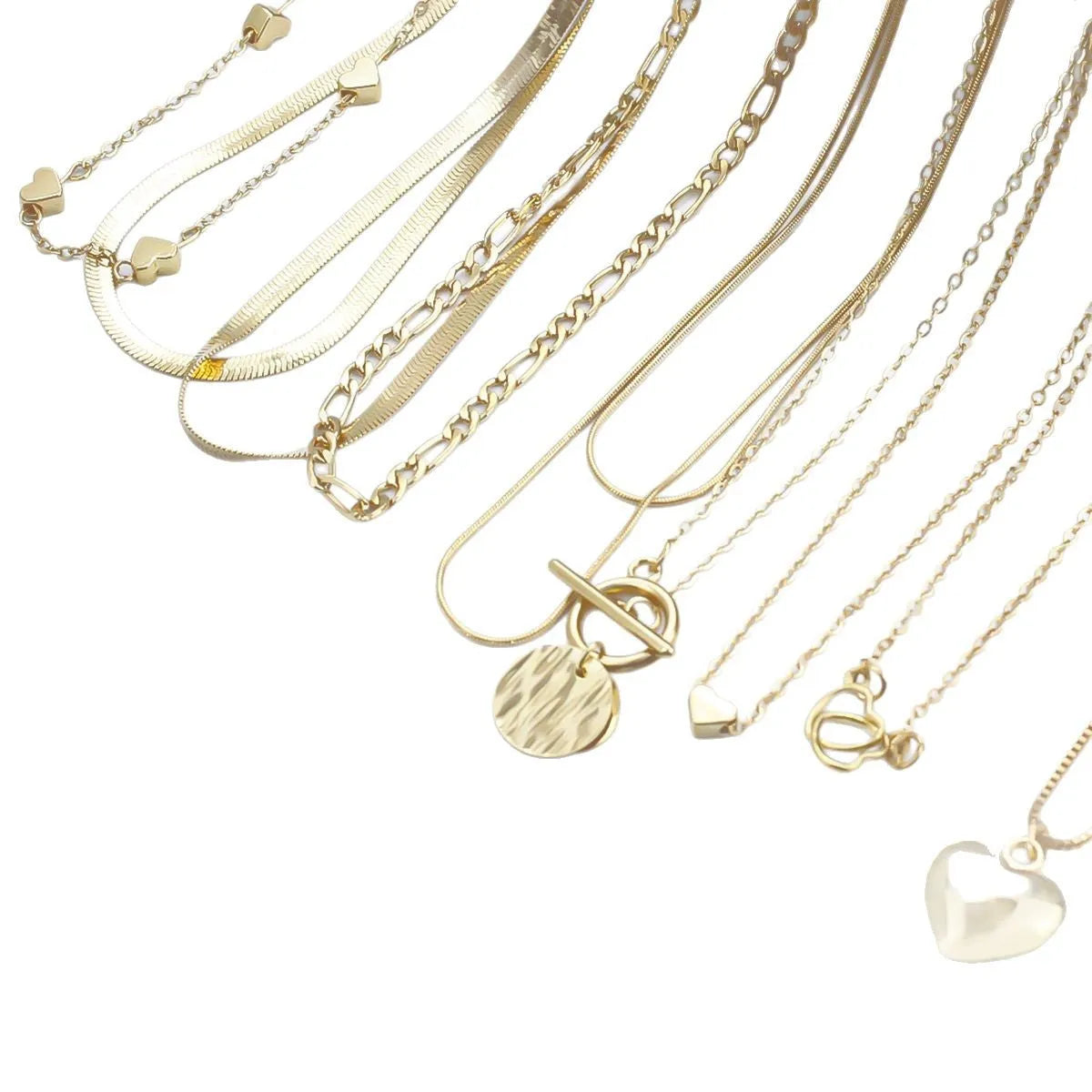 Ten-piece gold women's necklace set with adjustable snake bone chains and alloy pendants