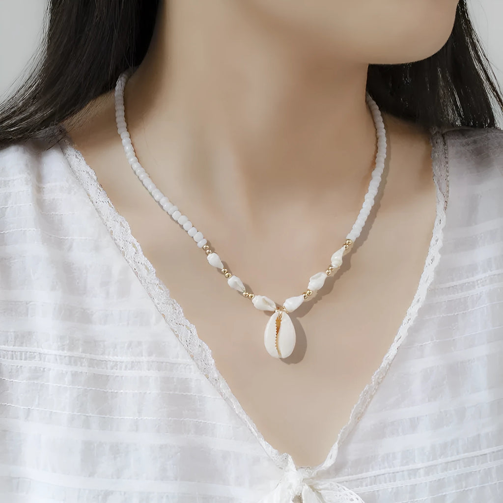 White conch shell necklace with mother of pearl pendant on silver electroplated chain