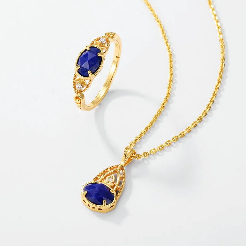 Women's oval geometric ring with blue lapis lazuli stone on a silver-coloured alloy band.