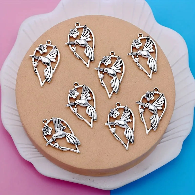 Alloy flying cuckoo bird pendant charm with electroplated finish for DIY jewellery making