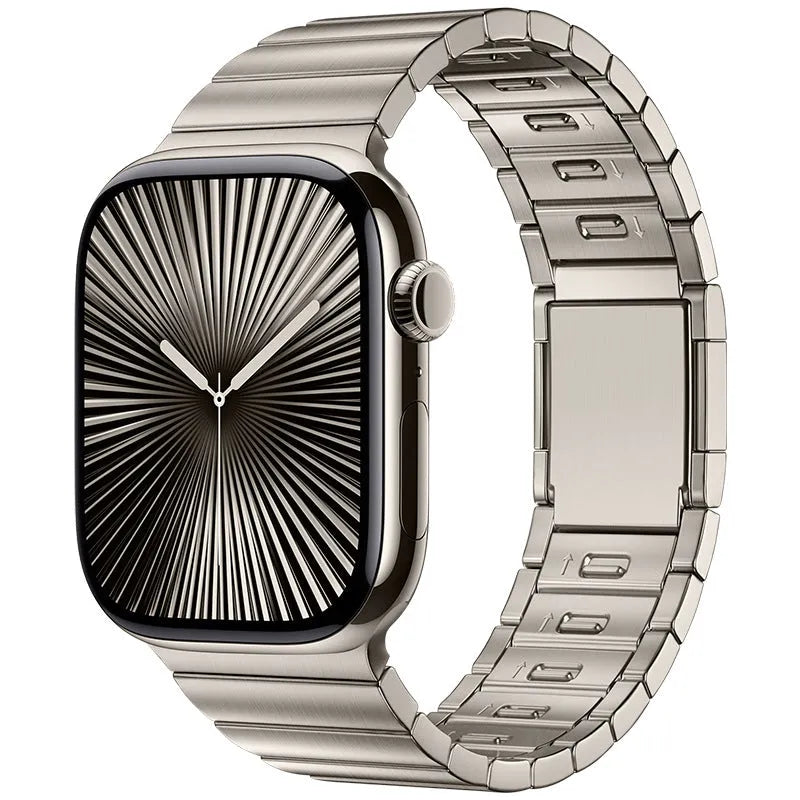 Stainless steel magnetic buckle Apple Watch strap showing silver colour option on wrist