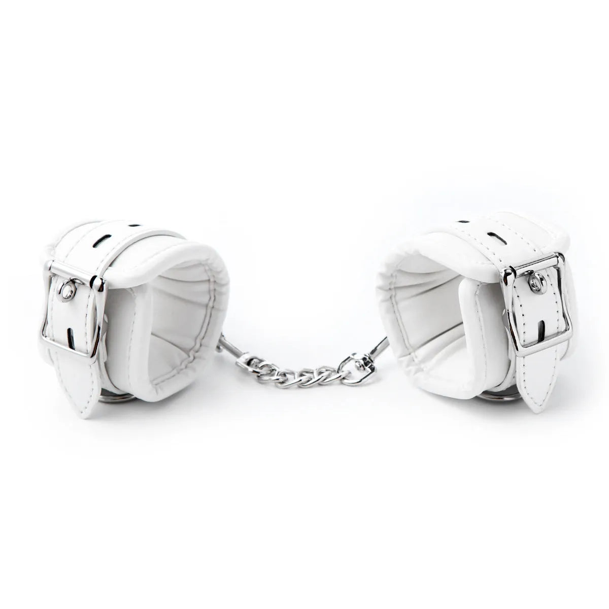 White PU sponge bondage set showing handcuffs, foot cuffs, and neck scarf arranged together