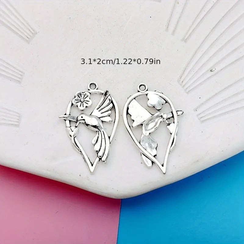 Alloy flying cuckoo bird pendant charm with electroplated finish for DIY jewellery making