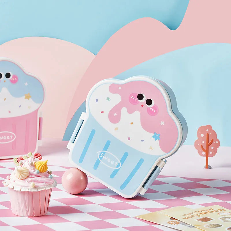 Pink and blue creative ice cream shaped plastic lunch box with bento compartment, spoon, and fork.