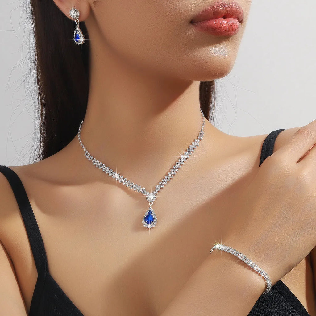 Rhinestone claw chain necklace and matching water drop earrings set in selected colour