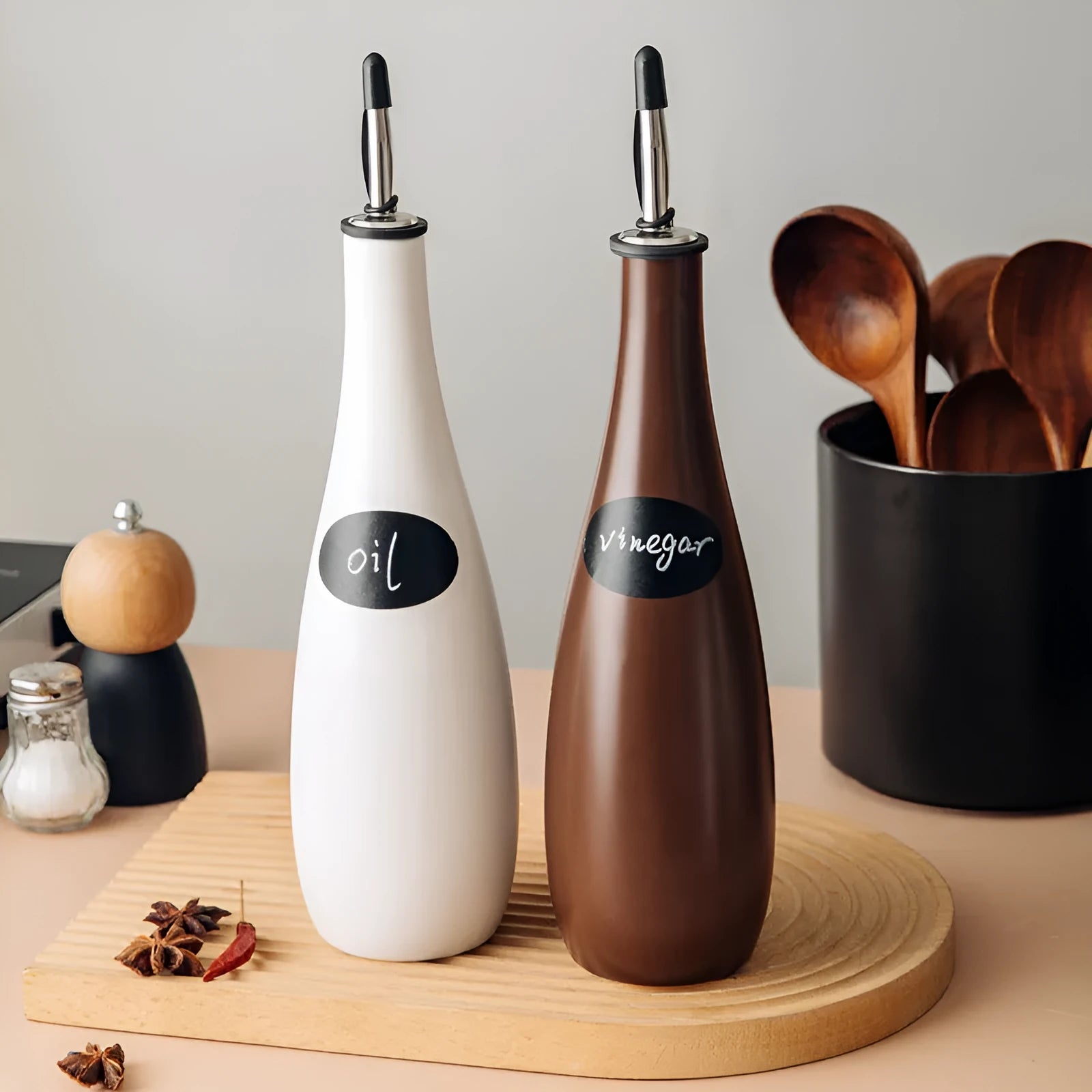 Ceramic oil pot with 650ml conical funnel and integrated oil brush in kitchen setting