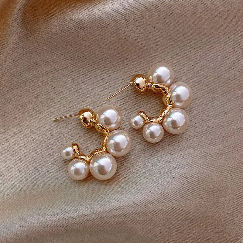 Red bell-shaped drop earrings for women with alloy construction, shown in red and white colour options