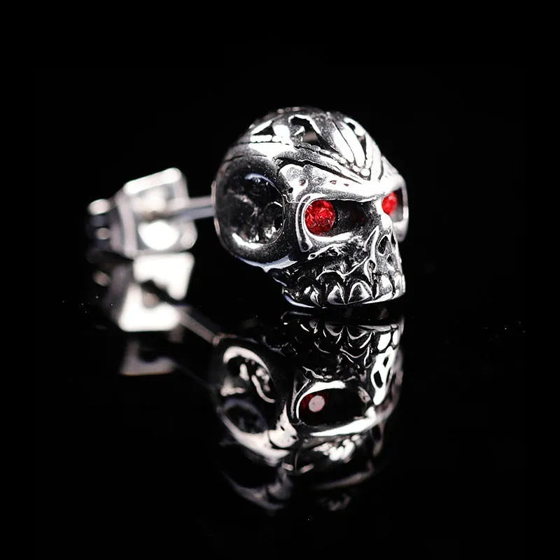 Red eye ghost head skull stud earrings with electroplated alloy construction and artificial gemstone details