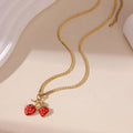 Stainless steel necklace with strawberry fruit pendant in red and white powder gradient colour options