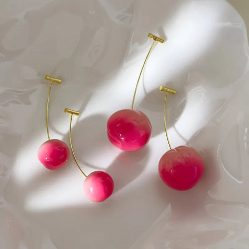 Acrylic peach fruit earrings in small and large sizes with copper posts