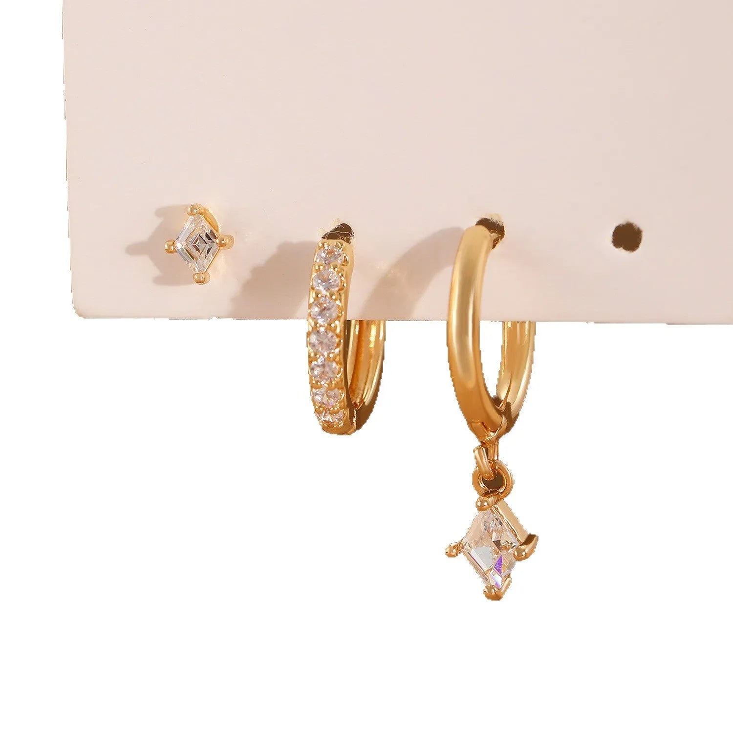 Ladies three-piece ear jewellery set with geometric diamond shapes and inlaid zircon stones in gold and white colours