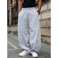 Men's dark grey high-waist straight-leg cropped casual trousers on a hanger.