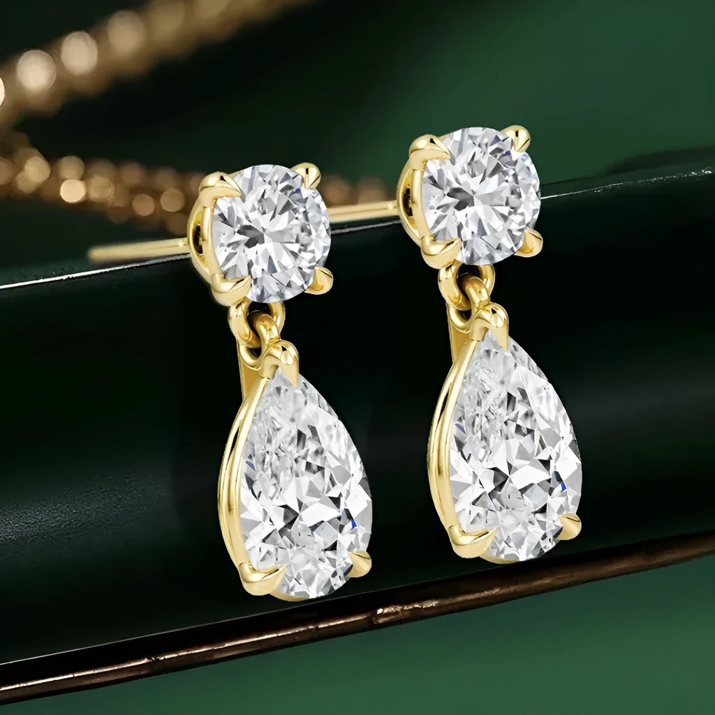 Sterling silver geometric stud earrings with round and water drop moissanite stones