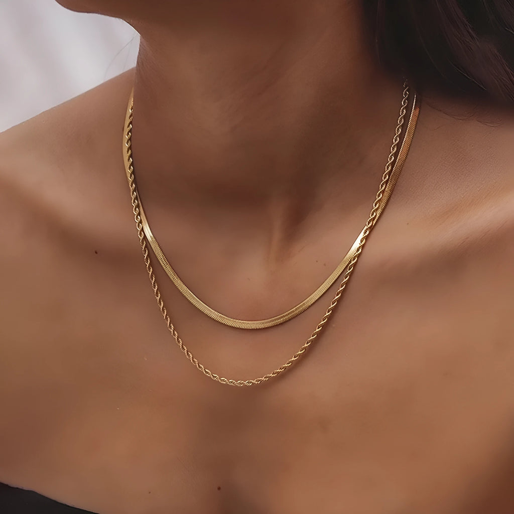 Geometric titanium steel pendant on adjustable snake bone chain necklace showing double-layer twist design