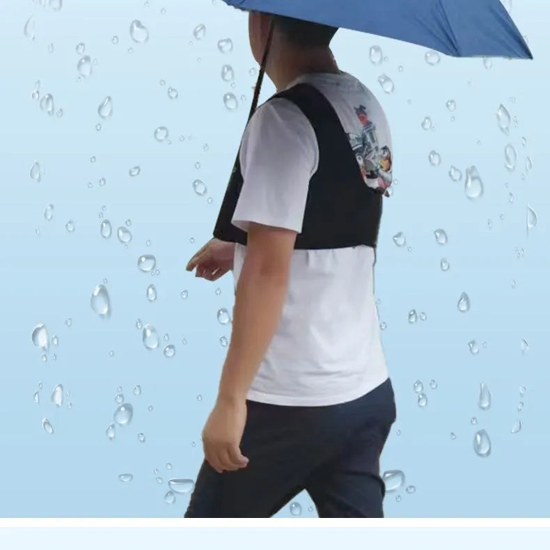 Black portable umbrella holder with a fixed shoulder strap, made from diving cloth, shown holding a manual umbrella.