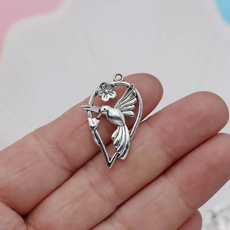 Alloy flying cuckoo bird pendant charm with electroplated finish for DIY jewellery making