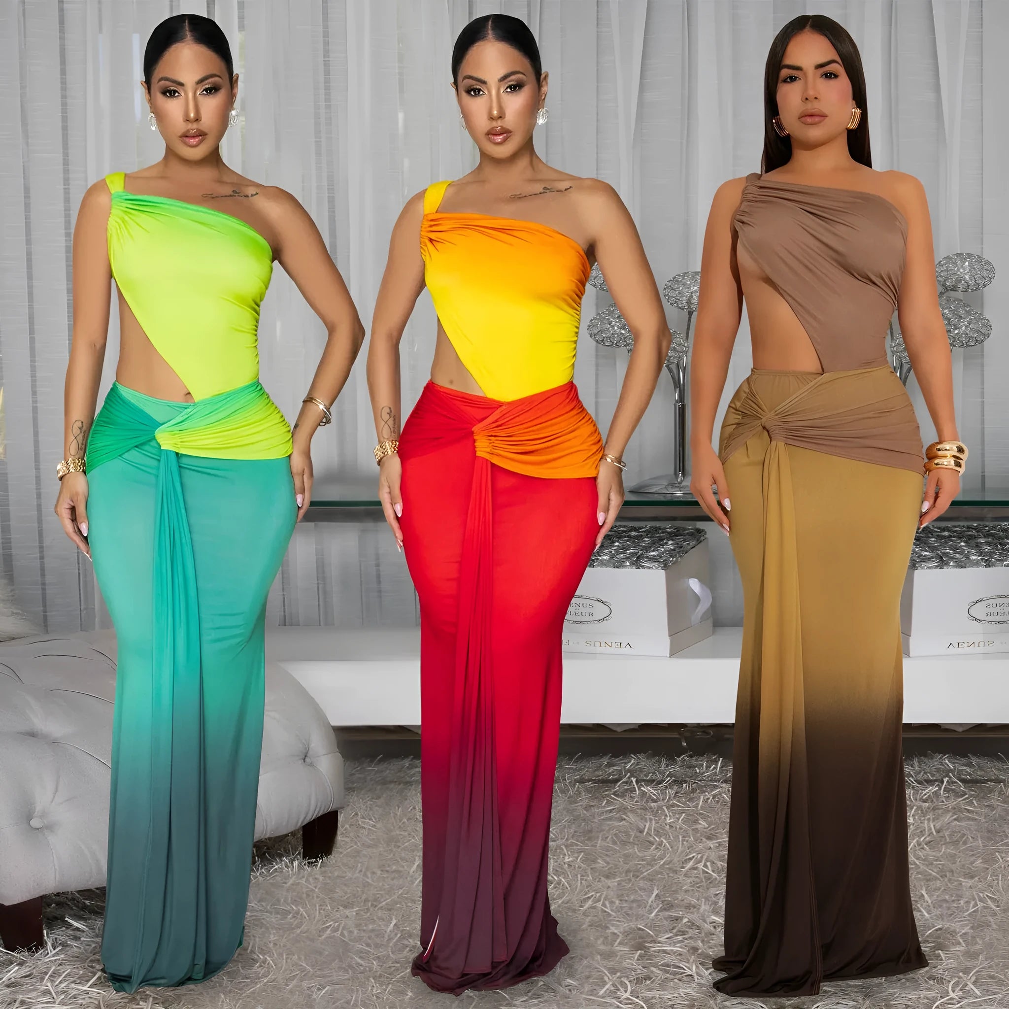 A woman's long gradient dress with a cross-shoulder neckline and high waist, shown in a colour option.