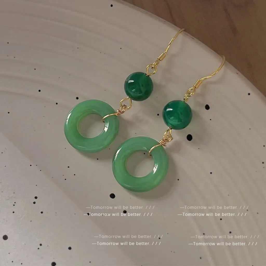 Green jade design peace buckle earrings with 14K gold plated zinc alloy finish